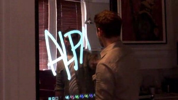 Interactive Mirror responds to touch Interactive Mirror responds to touch